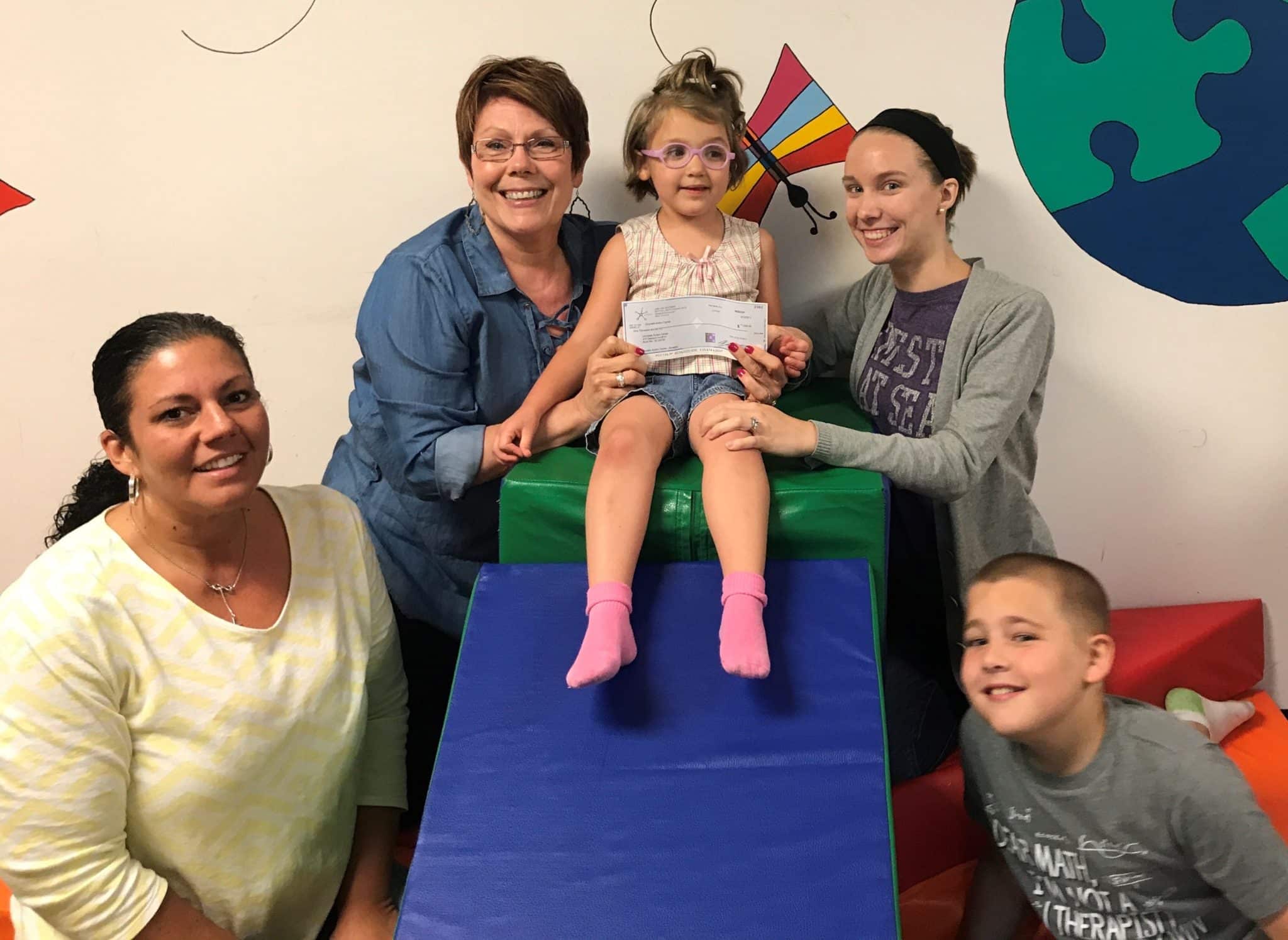 Servcom Makes Donation to Autism